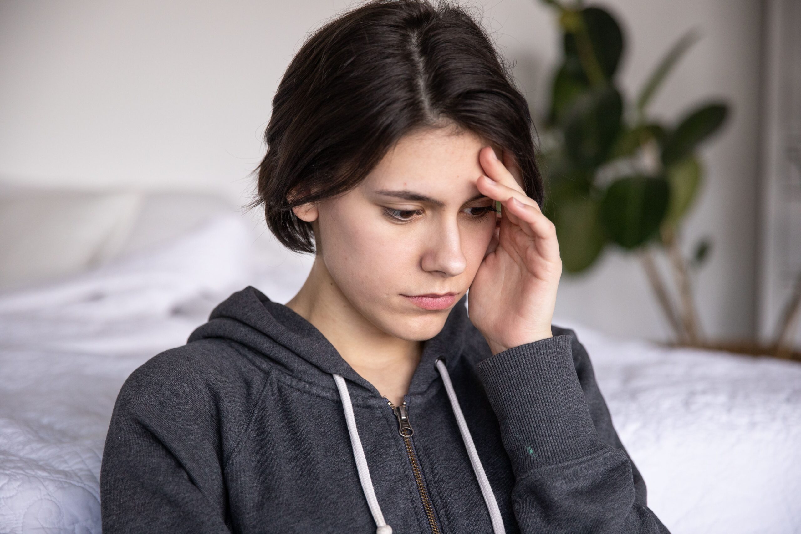 Teenager feeling overwhelmed by racing thoughts